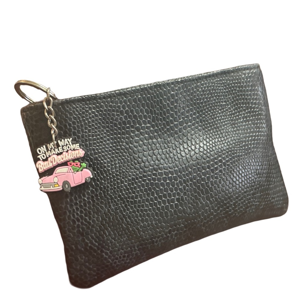 STEVE MADDEN Chic Black Textured Clutch with Playful Charm